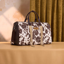 Load image into Gallery viewer, WG444-5110CF Wrangler Cow Print Fringe Duffle/Crossbody - Coffee
